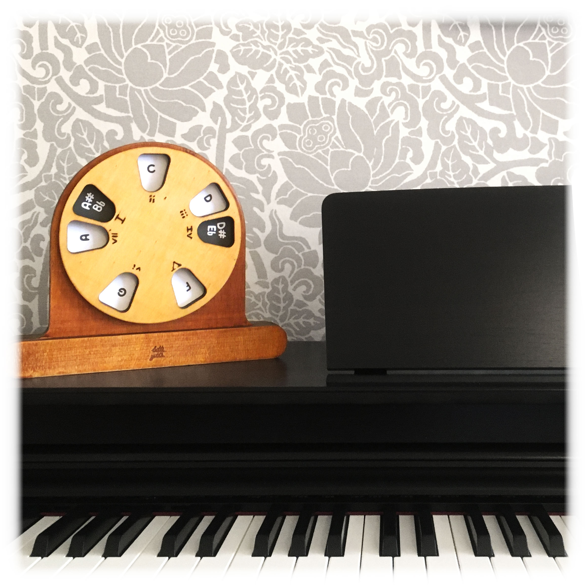 The Wooden Musical Wheel on the piano